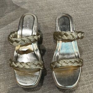 new in box, Bamboo metallic gold sandal with a woven heel. 4 in back to 2 heel